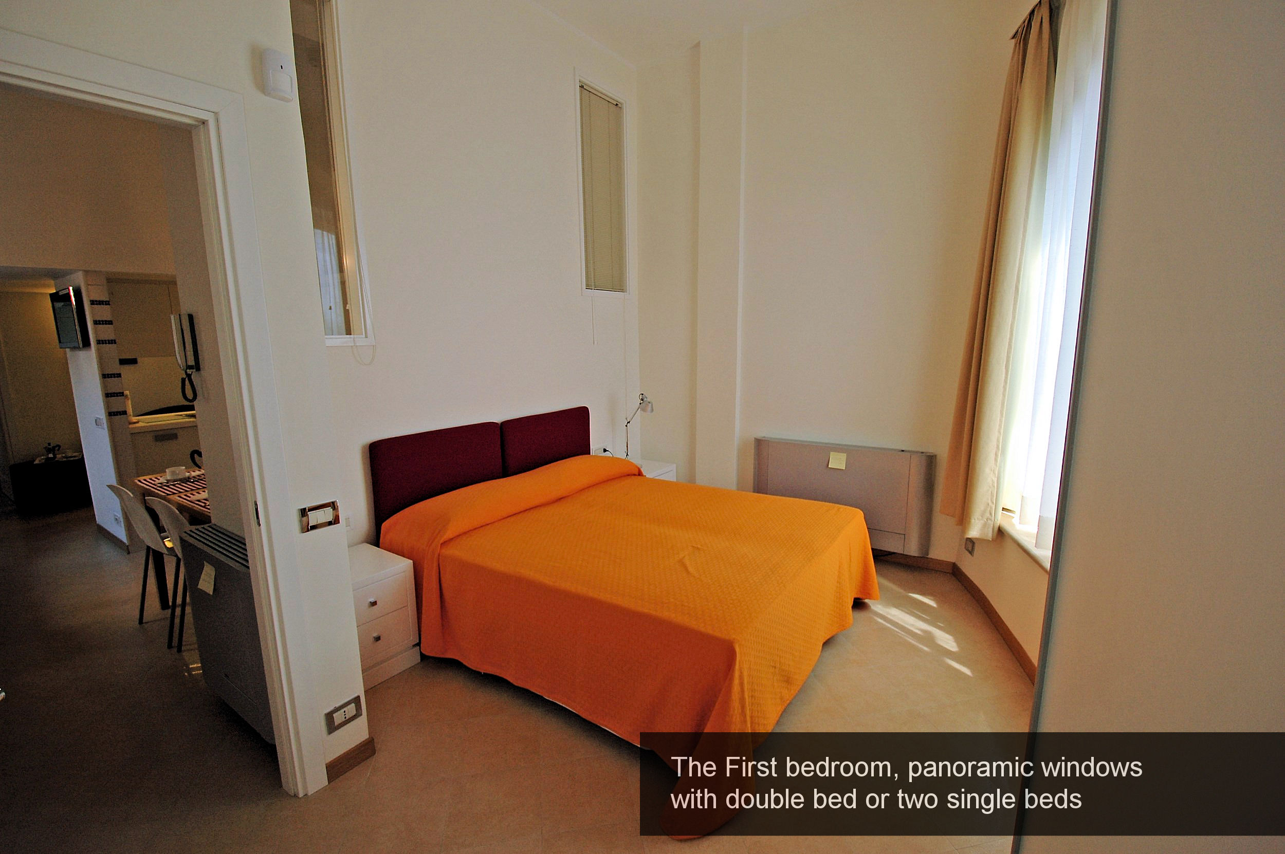 3) First bedroom, panoramic windows with double bed or two single beds